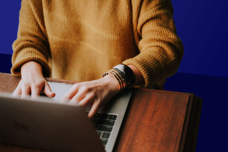 Hands-On Support for Artificial Intelligence Woman typing on a computer
