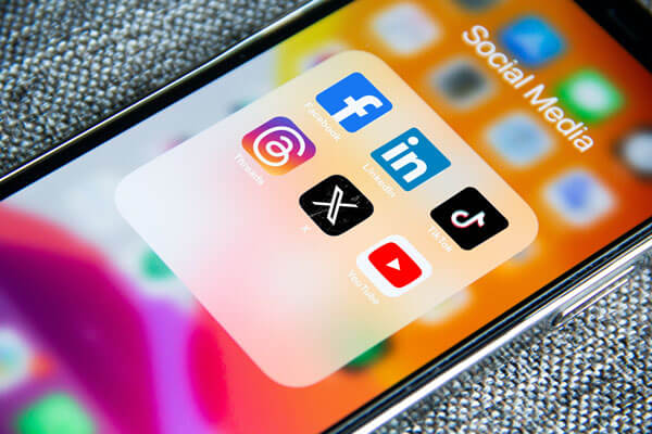 Social media icons on a smartphone screen